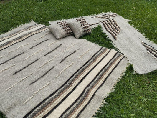 Luxurious handmade wool blanket crafted from 100% natural soft wool, perfect for cozy evenings or stylish home decor.